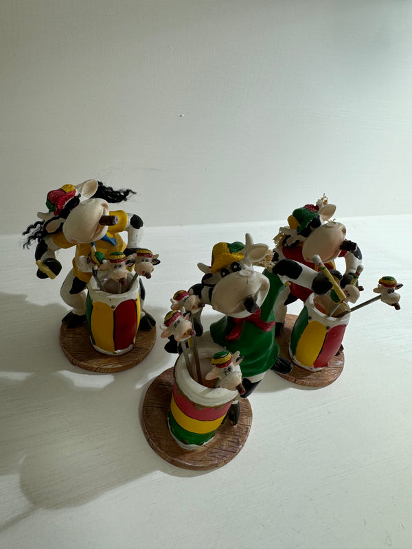 PUPAZZO PRENDI OLIVE RESINA